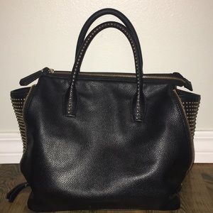 Charming Charlie Black purse with Gold Studs